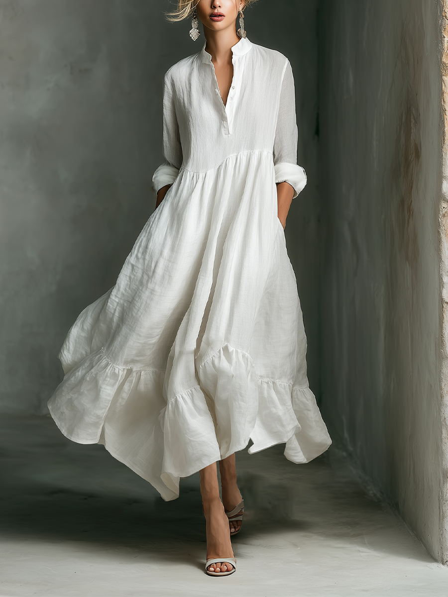 Abito lungo bianco con maniche lunghe e volant per donna