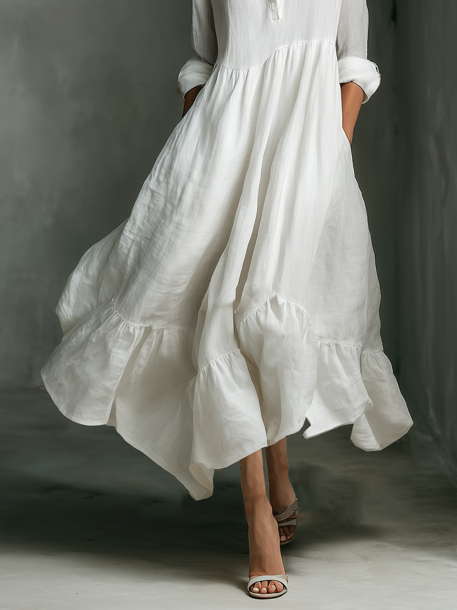 Abito lungo bianco con maniche lunghe e volant per donna
