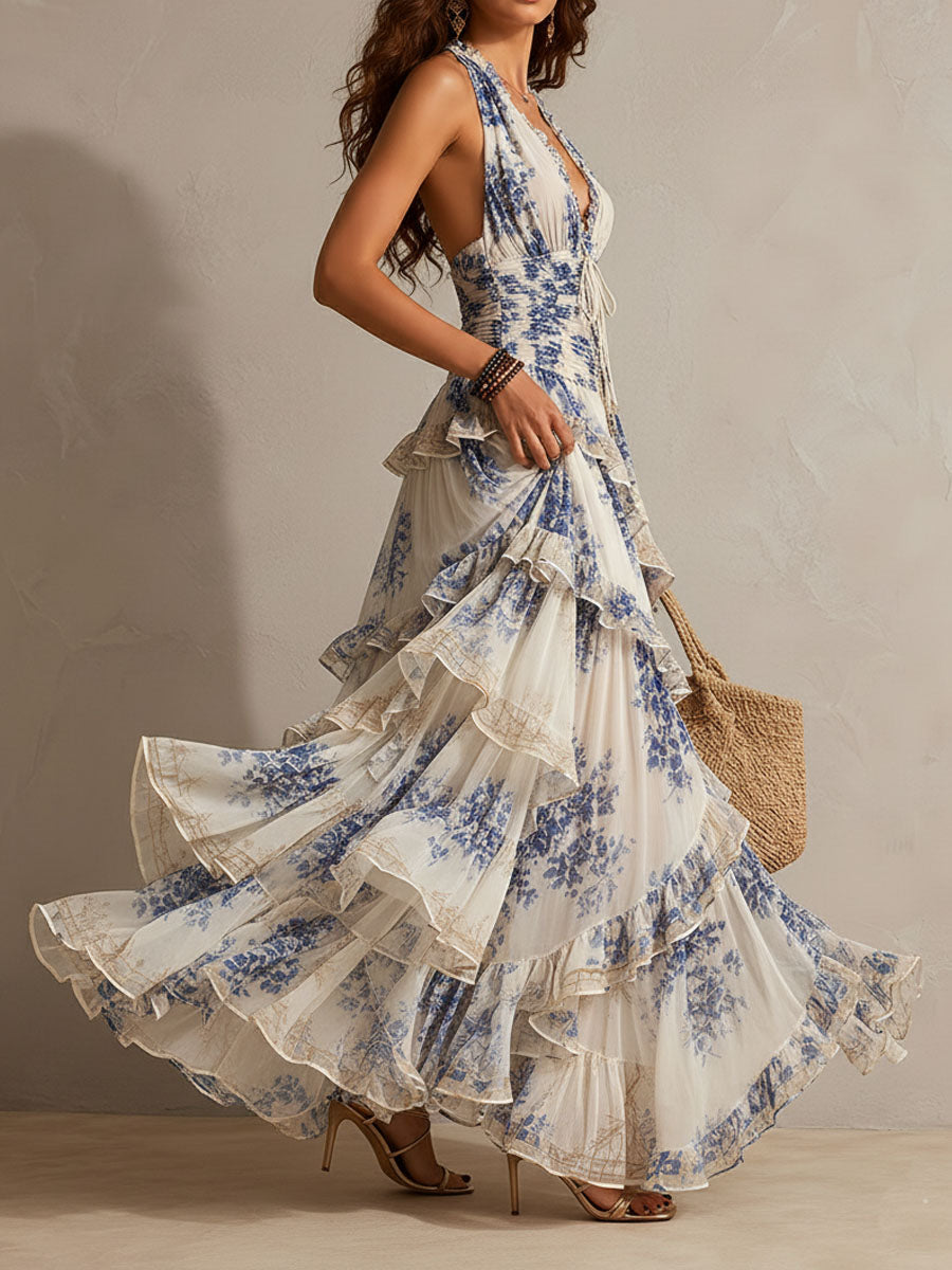 Maxi Abito Floreale Blu e Bianco con Collo Halter e Dettagli Volant