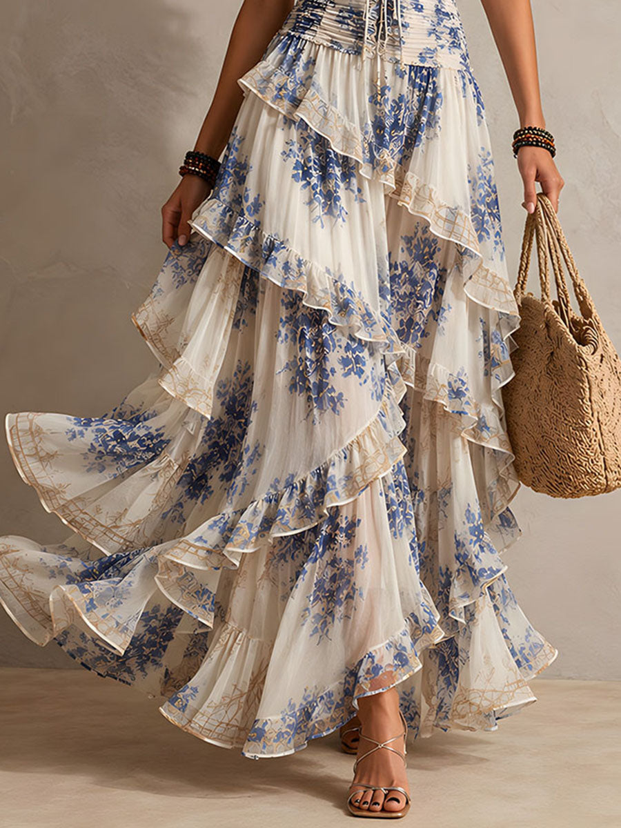 Maxi Abito Floreale Blu e Bianco con Collo Halter e Dettagli Volant