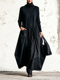 Abito Maxi Oversized Nero con Collo Alto e Dettaglio Tasche